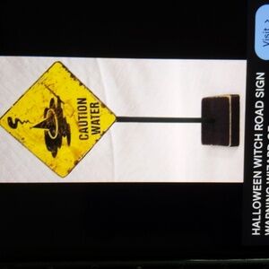 Caution water Halloween decoration witch road sign